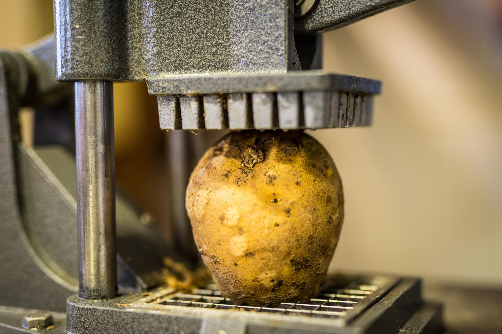 Potatoes being peeled gently without damage at Shiv Shree Food